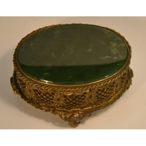 1356 - A 19th century gilt metal and spinach jade oval casket, hinged cover, the side pierced and chased wi... 