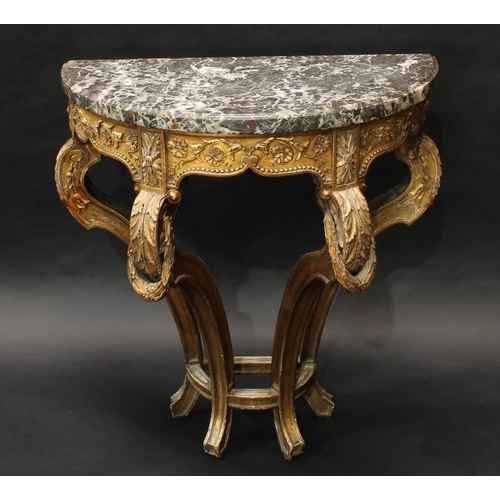 1360 - A 19th century giltwood demilune console table, veined marble top above a deep frieze carved with le... 