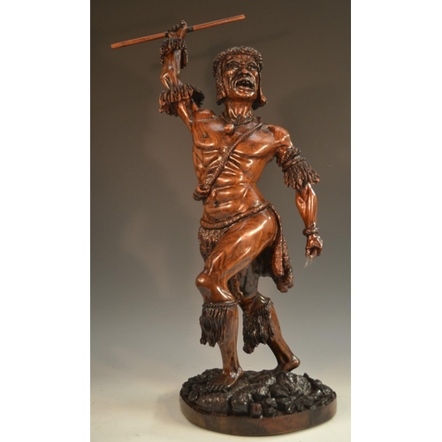 1365 - A 19th century hardwood figure, of an African warrior, standing with spear raised, 60cm high