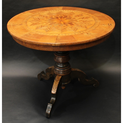 1370 - A 19th century Italian walnut and parquetry tripod centre table, the circular top inlaid with a laye... 