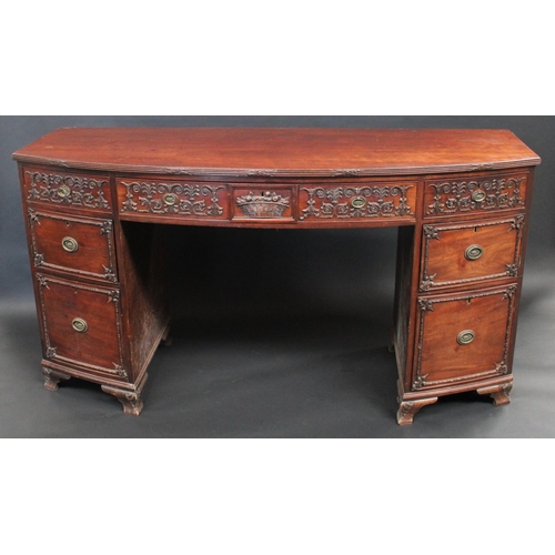 1374 - A 19th century mahogany bow fronted sideboard, in the Chippendale Rococo taste, slightly oversailing... 