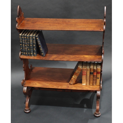 1378 - A 19th century mahogany room centre waterfall open bookcase/whatnot, shaped end supports, downswept ... 