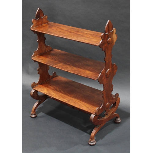 1378 - A 19th century mahogany room centre waterfall open bookcase/whatnot, shaped end supports, downswept ... 