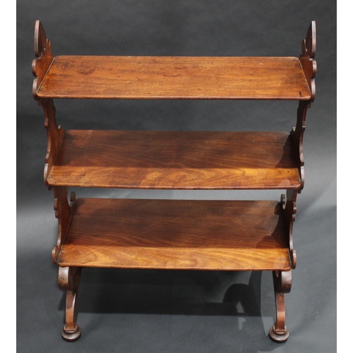 1378 - A 19th century mahogany room centre waterfall open bookcase/whatnot, shaped end supports, downswept ... 