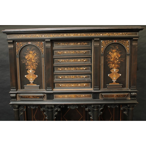 1381 - A 19th century marquetry 'Wunderkammer' side cabinet, moulded top above an architectural arrangement... 