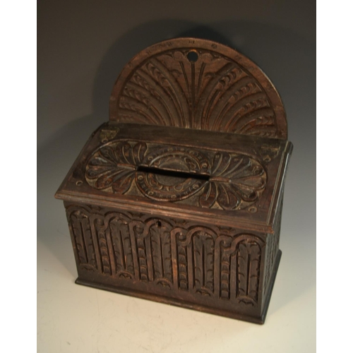 1386 - A 19th century oak country house post box, arched cresting, hinged sloping cover with letter apertur... 