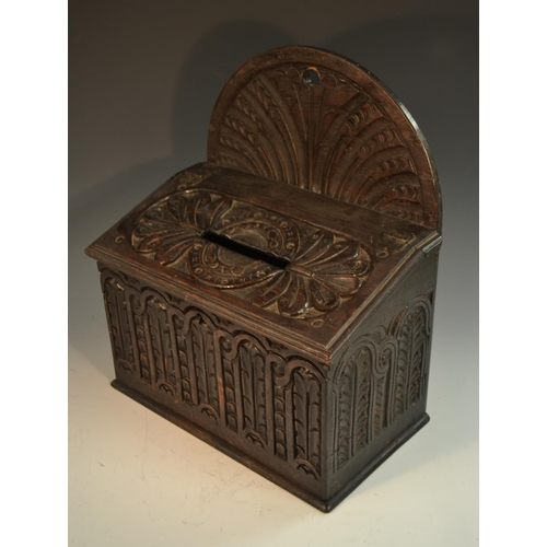 1386 - A 19th century oak country house post box, arched cresting, hinged sloping cover with letter apertur... 