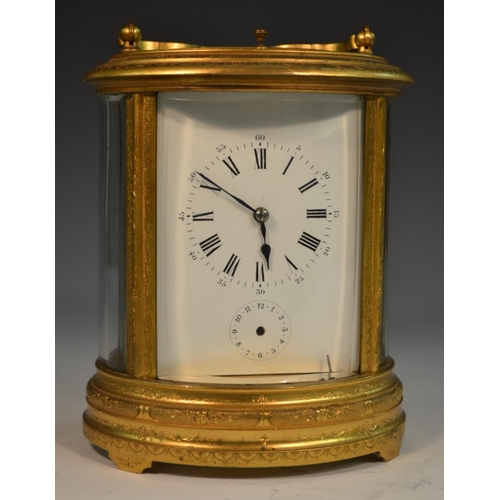 1389 - A 19th century oval repeater carriage clock, Roman numerals, subsidiary dial, engraved with foliage,... 