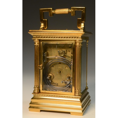 1391 - A 19th century repeater carriage clock, with Roman numerals, silvered chapter ring, fluted column to... 