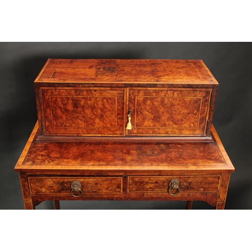 1404 - A 19th century walnut bonheur du jour, the rectangular superstructure with a pair of rectangular doo... 