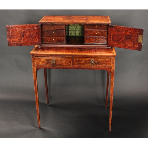 1404 - A 19th century walnut bonheur du jour, the rectangular superstructure with a pair of rectangular doo... 