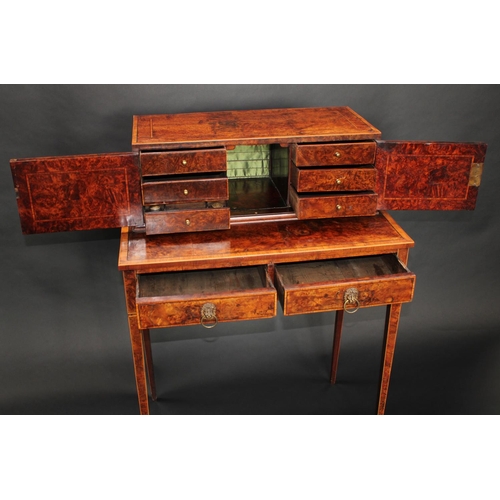 1404 - A 19th century walnut bonheur du jour, the rectangular superstructure with a pair of rectangular doo... 