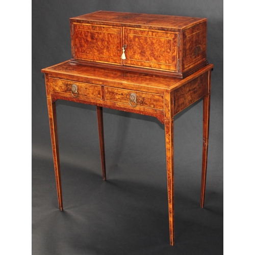 1404 - A 19th century walnut bonheur du jour, the rectangular superstructure with a pair of rectangular doo... 