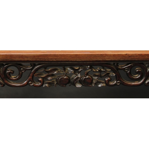 1420 - A Chinese hardwood altar table, rectangular top above a deep frieze pierced and carved with peaches ... 