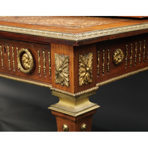 1464 - A Franglias Louis XVI Revival gilt metal mounted mahogany desk, inverted break-centre superstructure... 