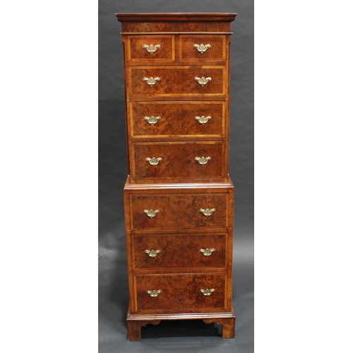 1473 - A George I style crossbanded walnut chest on chest, of small and narrow proportions, outswept cornic... 