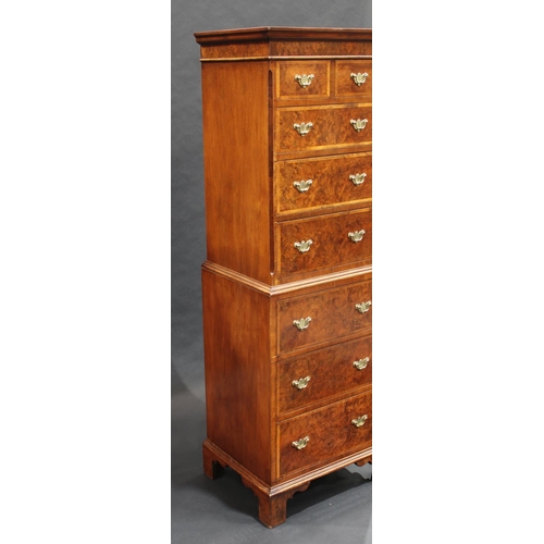 1473 - A George I style crossbanded walnut chest on chest, of small and narrow proportions, outswept cornic... 