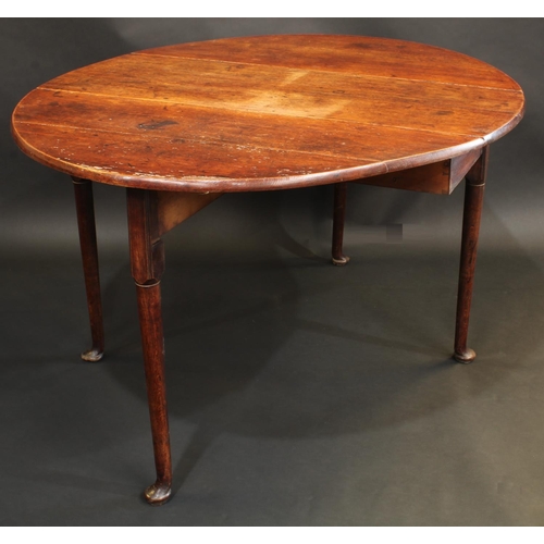 1488 - A George II oak oval drop leaf dining table, straightened cabriole legs, pad feet, 74cm high, 113cm ... 