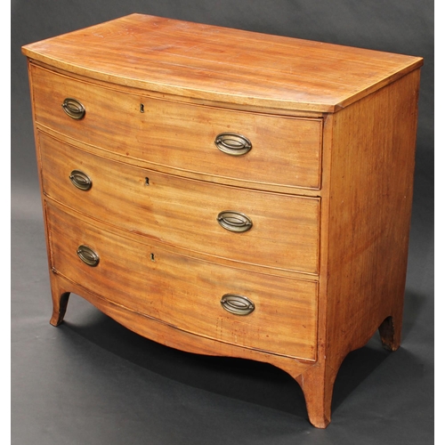 1502 - A George III mahogany bow fronted chest, of three long graduated cockbeaded drawers, crossbanded top... 