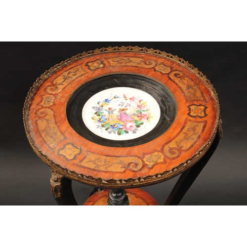 1510 - A 19th century French kingwood and marquetry circular occasional table, the top set with a porcelain... 