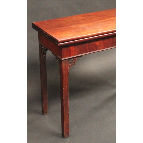 1517 - A George III mahogany rectangular tea table, in the provincial Gothic Chippendale taste, folding top... 