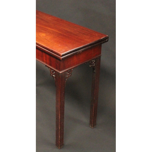 1517 - A George III mahogany rectangular tea table, in the provincial Gothic Chippendale taste, folding top... 