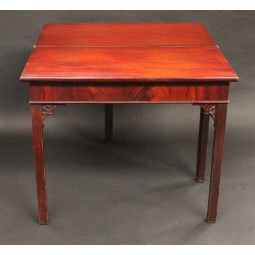 1517 - A George III mahogany rectangular tea table, in the provincial Gothic Chippendale taste, folding top... 