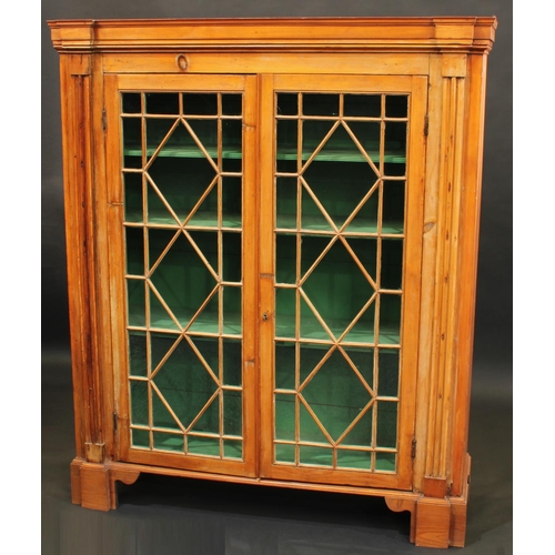 1545 - A George III pine display cabinet, astragal glazed doors flanked by reeded pilasters, later bracket ... 