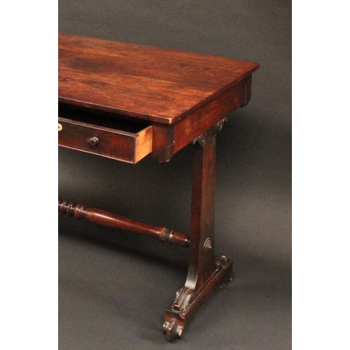 1562 - A George IV rosewood rectangular library table, well figured top above a pair of cockbeaded frieze d... 