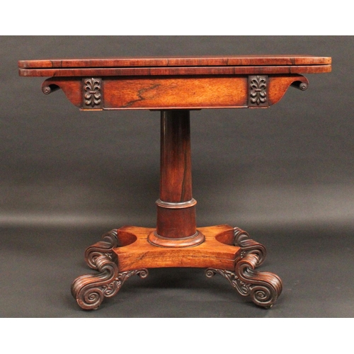 1566 - A George/William IV rosewood rounded rectangular card table, folding top enclosing an inset baize li... 