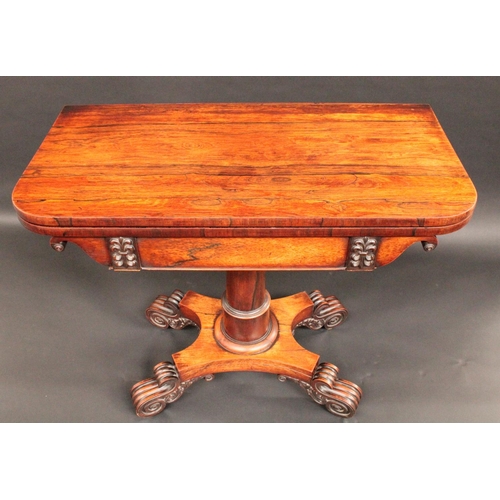 1566 - A George/William IV rosewood rounded rectangular card table, folding top enclosing an inset baize li... 