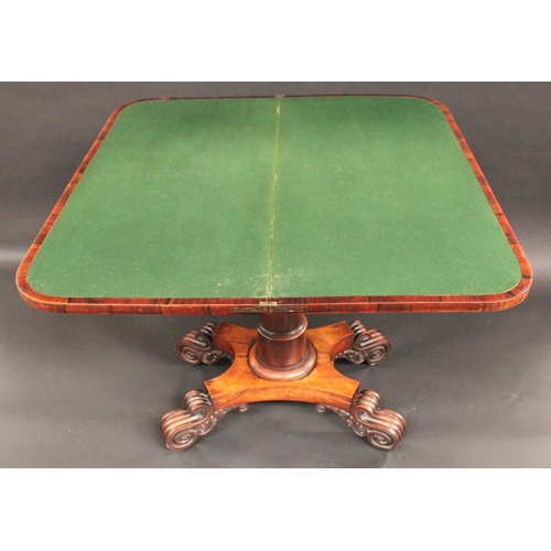 1566 - A George/William IV rosewood rounded rectangular card table, folding top enclosing an inset baize li... 