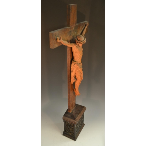 1585 - A large 19th century French boxwood Corpus Christi, oak crucifix and pedestal, the frieze of which i... 