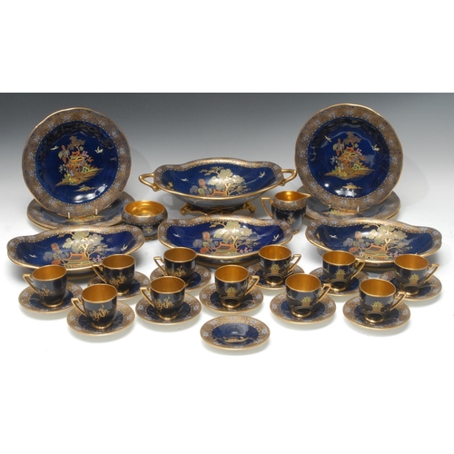 16 - A Carlton Ware Chinoiserie pattern tea and dessert service, comprising eleven cups, twelve saucers, ... 