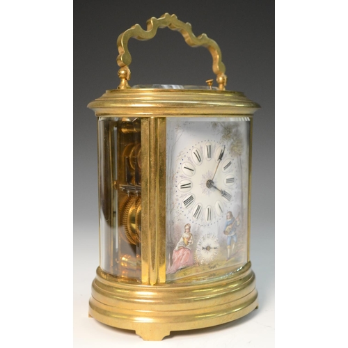 1603 - A late 19th/early 20th century gilt metal and enamelled oval repeater carriage clock, enamelled with... 