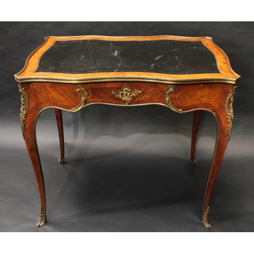 1610 - A Louis XV Revival gilt metal mounted rosewood serpentine bureau plat, of small and neat proportions... 