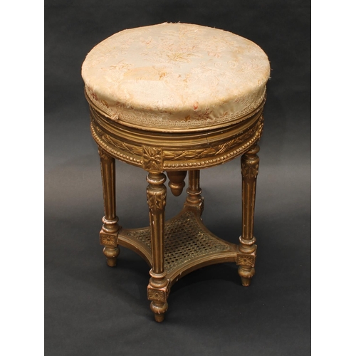 1618 - A Louis XVI Revival giltwood adjustable music stool, stuffed over seat raising on a screw thread, ab... 