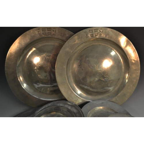 1646 - A pair of 18th century circular pewter chargers, 41.5cm diam, touch marks;  another, smaller, 38cm d... 