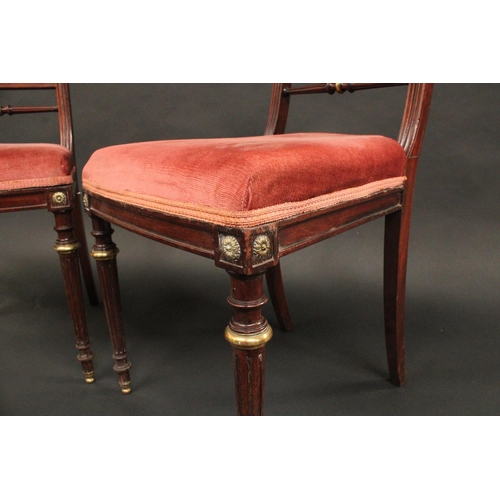 1651 - A pair of 19th century brass mounted mahogany side chairs, of Louis XVI influence, each scroll back ... 