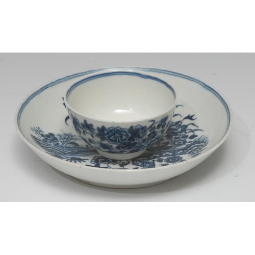 166 - A Worcester Fence pattern miniature pattern tea bowl and saucer, decorated in underglaze blue with f... 