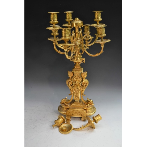 1679 - A pair of Louis XVI Revival gilt-metal nine-light table candelabrum, campana sconces, circular drip ... 