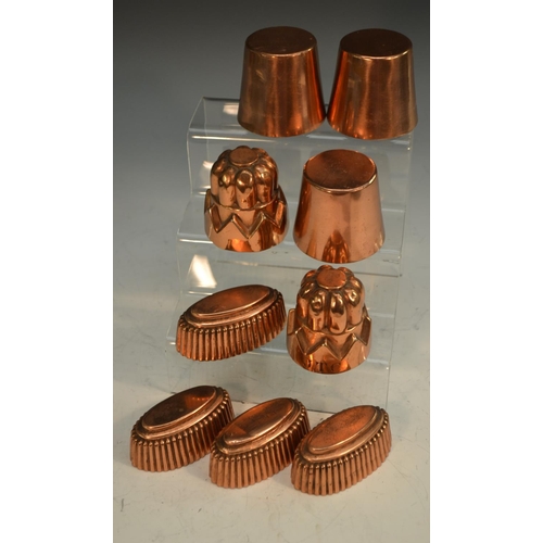 1687 - A pair of small 19th century copper 'castle' jelly or ice moulds, inscribed JTC, 6cm high, others, b... 