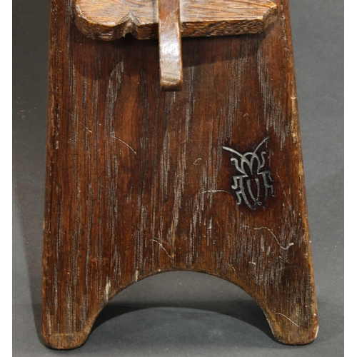 1726 - A set of six oak chairs, each with hand hole, shaped seats, T stretchers, carved with a beetle, mid ... 