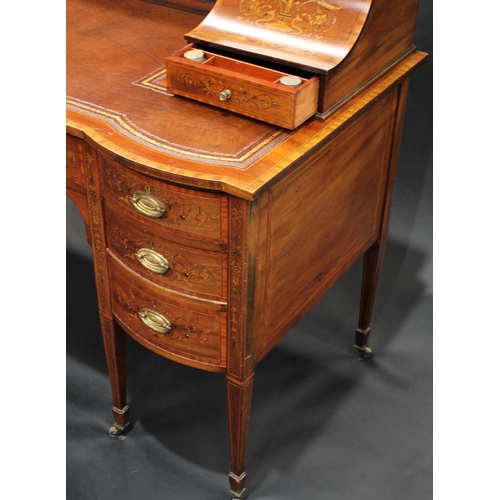 1734 - A Sheraton Revival satinwood crossbanded mahogany and marquetry writing desk, the inverted break-cen... 