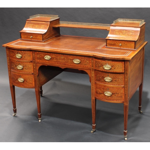 1734 - A Sheraton Revival satinwood crossbanded mahogany and marquetry writing desk, the inverted break-cen... 