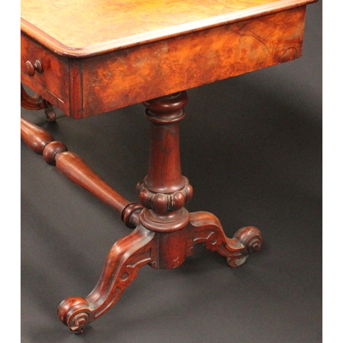 1755 - A Victorian burr walnut rounded rectangular library table, moulded top with matched veneers, above t... 