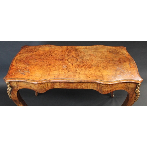 1766 - A Victorian gilt metal mounted burr walnut and marquetry shaped rectangular occasional writing table... 