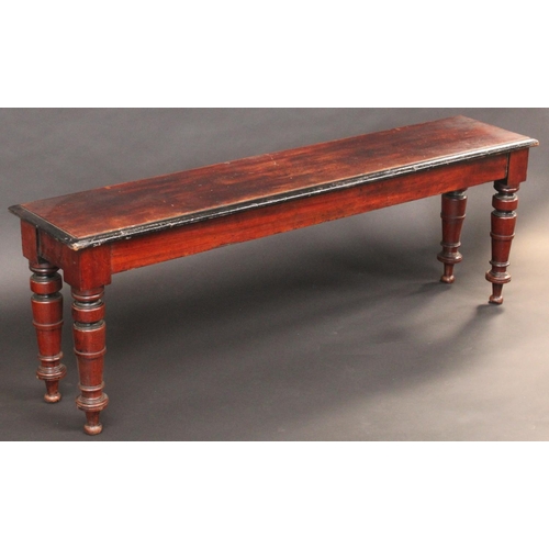 1788 - A Victorian mahogany window seat, rectangular top with moulded edge, above a deep frieze, turned leg... 