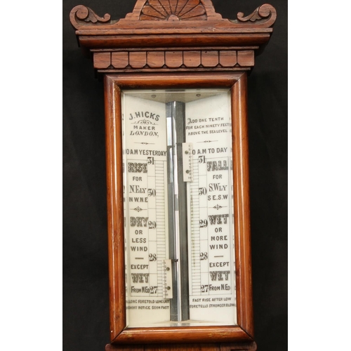 1789 - A Victorian oak stick barometer, the rectangular register marked J.Hicks, London, demilune floral cr... 