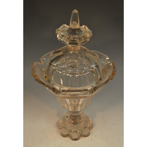 197 - A 19th century glass lantern-shaped pedestal sweetmeat vase and cover, slightly tapering, panelled t... 